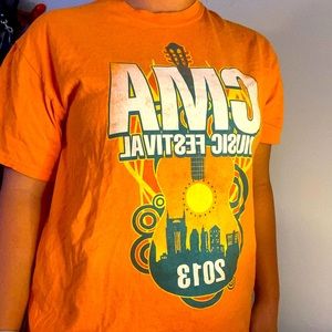 CMA orange tee